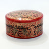 Red and black round paper mache box